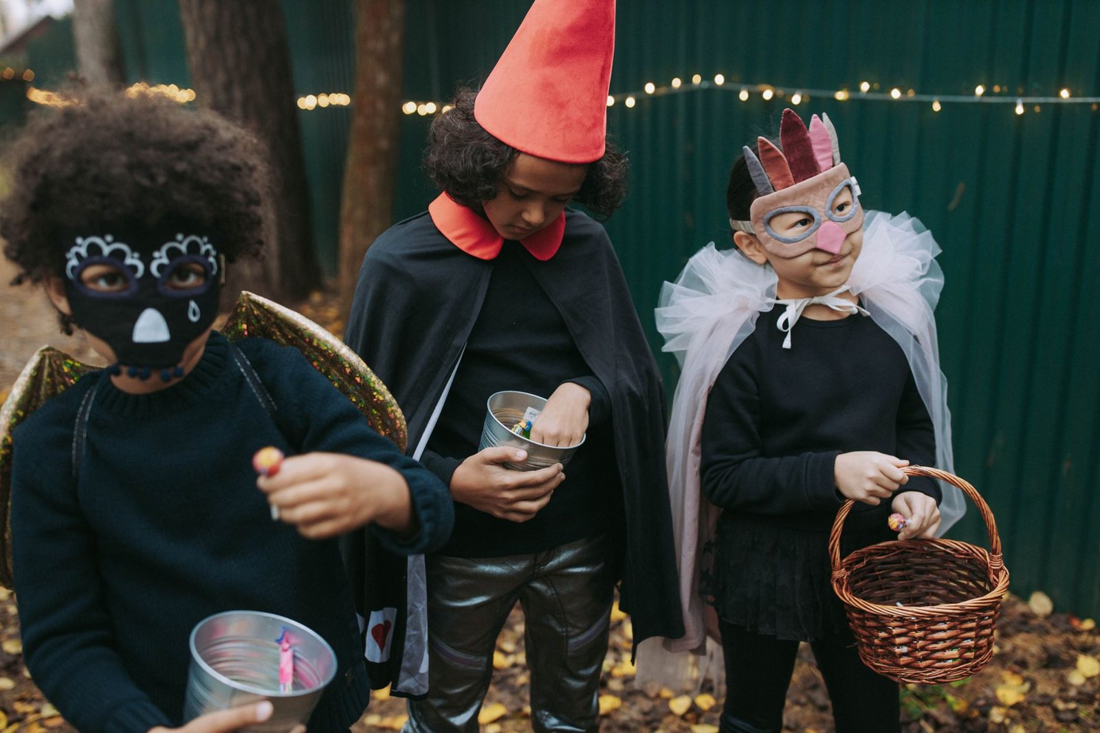 Kids sharing candy in costumes