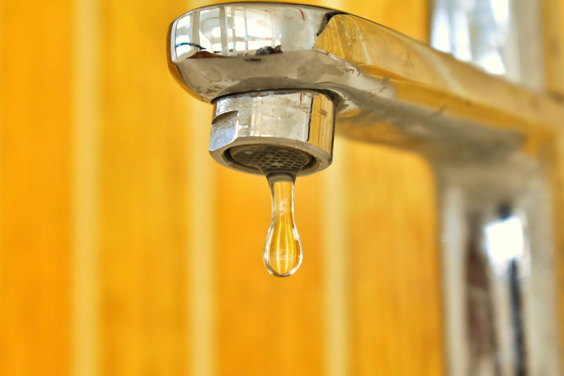 A faucet left dripping to prevent a freeze